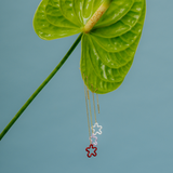 FLOWER CHAIN SINGLE EARRING IN BURGUNDY